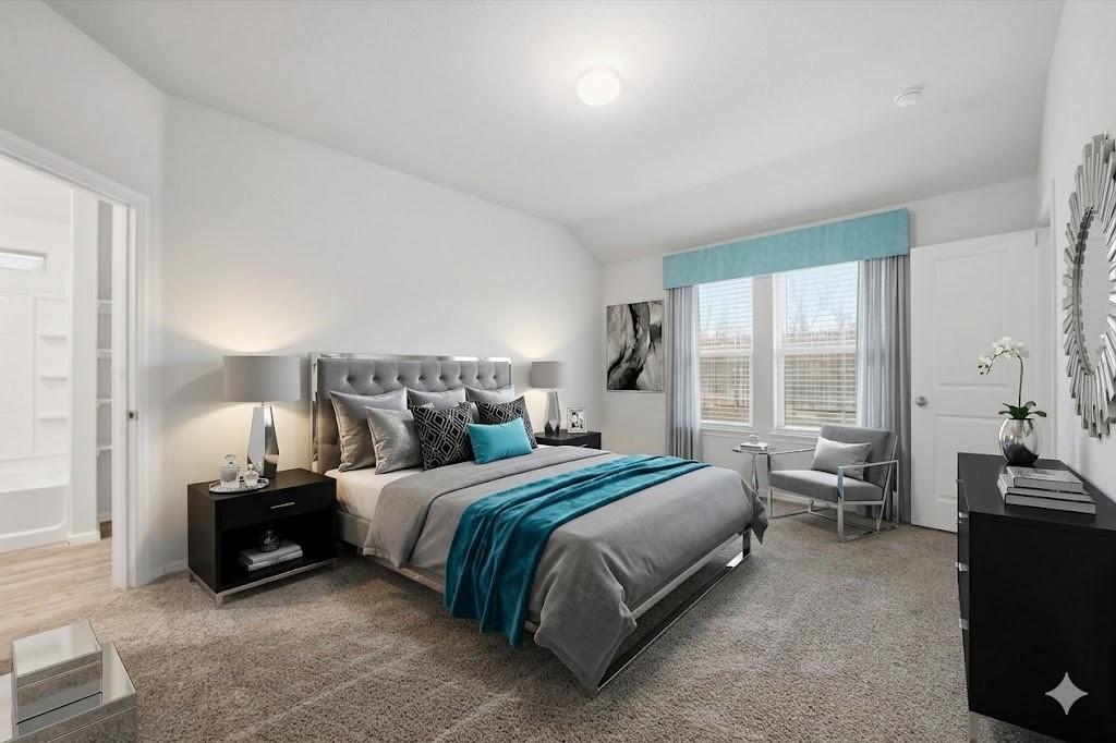 9308 Desertrock Road Fort Worth, TX 76131 - Photo 9 of 23 a bedroom with a bed and wooden floor