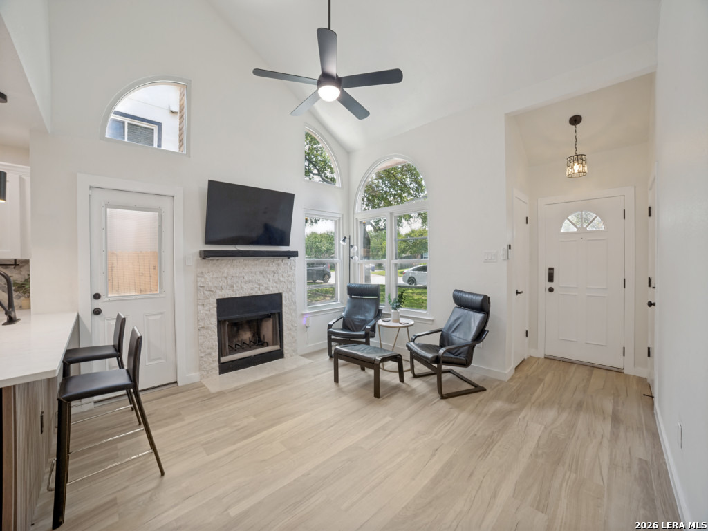 3439 Ridge Ranch San Antonio, TX 78247 - Photo 5 of 25 a living room with furniture and a fireplace