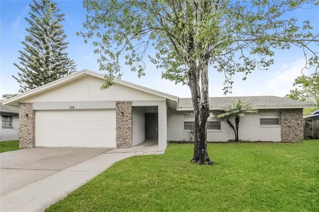 a front view of house with yard