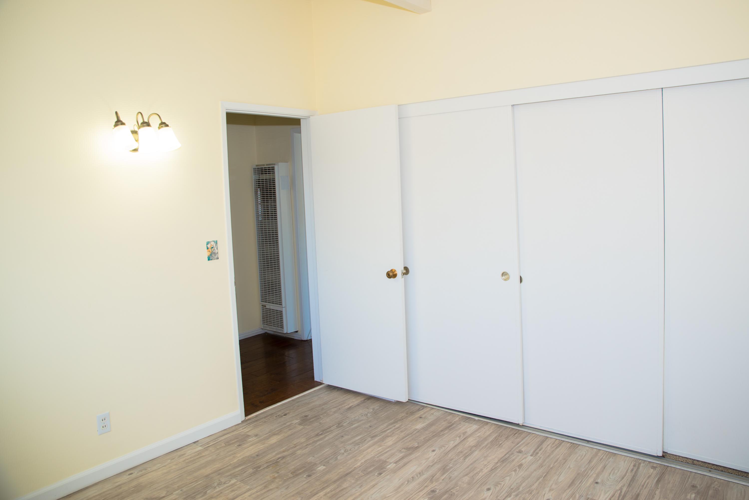 4950 Sandyland Road, Unit 220 Carpinteria, CA 93013 - Photo 16 of 20 a view of a small space with wooden floor and a window