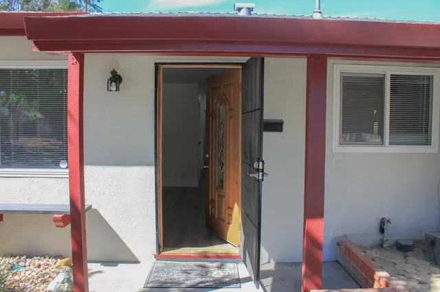 a front view of a house with a shower
