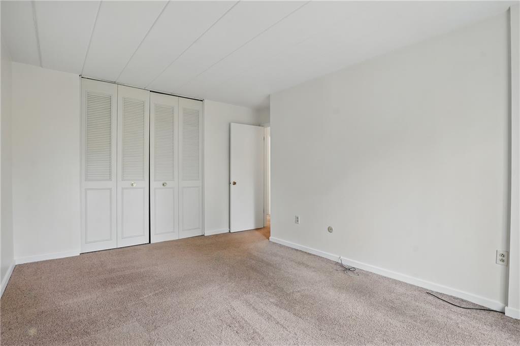 5 Bayard Road, Unit 400 Pittsburgh, PA 15213 - Photo 21 of 33 Soft, plush carpeting provides the perfect foundation for the bedroom.