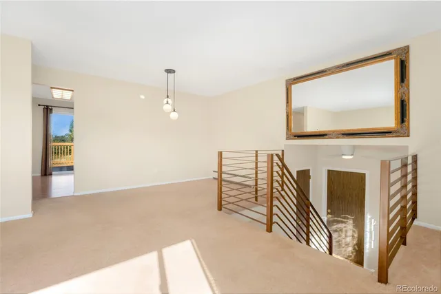 a view of a livingroom with furniture