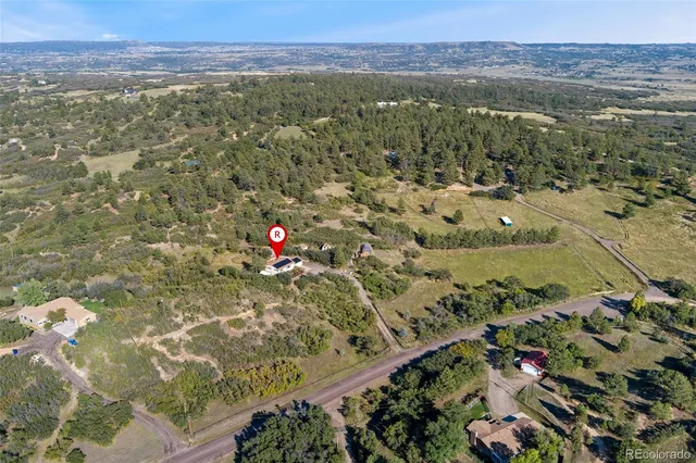 a view of an ocean and a mountain