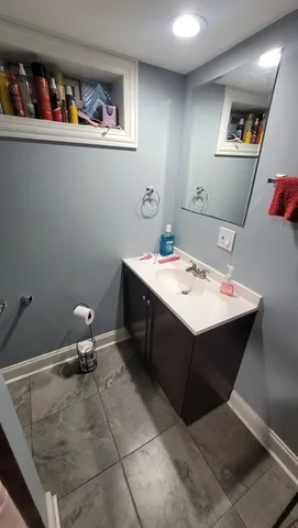 a room with a wooden floor and furniture