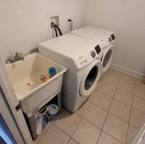 a utility room with dryer and washer