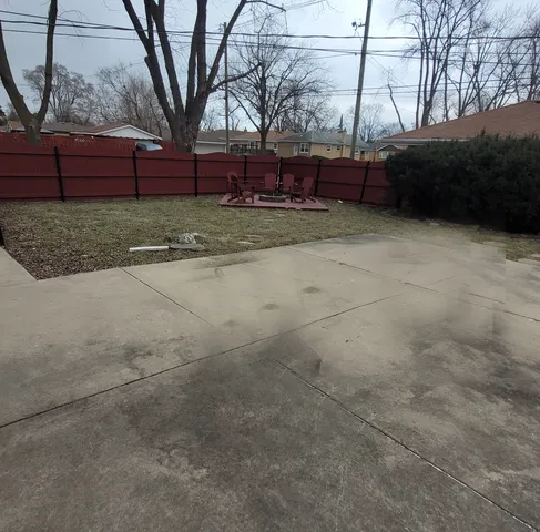 a view of a back yard of the house
