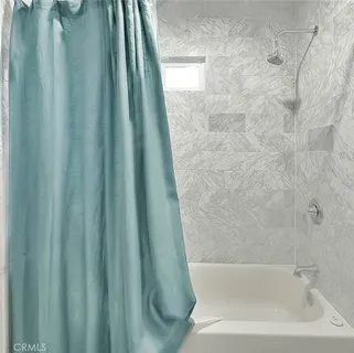 a bathroom with a bathtub