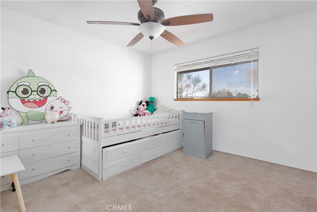 19801 Talihina Road Apple Valley, CA 92307 - Photo 18 of 32 a view of room with cabinet