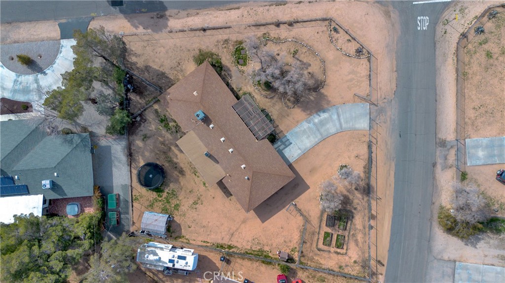 19801 Talihina Road Apple Valley, CA 92307 - Photo 27 of 32 an aerial view of a house with a backyard