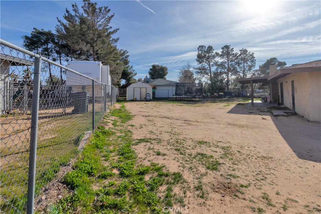 19801 Talihina Road Apple Valley, CA 92307 - Photo 29 of 32 a backyard of a house