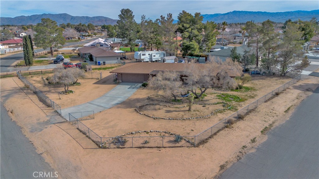 19801 Talihina Road Apple Valley, CA 92307 - Photo 30 of 32 an aerial view of a house with a yard basket ball court and outdoor seating