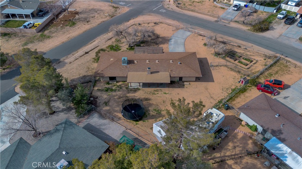 19801 Talihina Road Apple Valley, CA 92307 - Photo 32 of 32 an aerial view of a house with a swimming pool