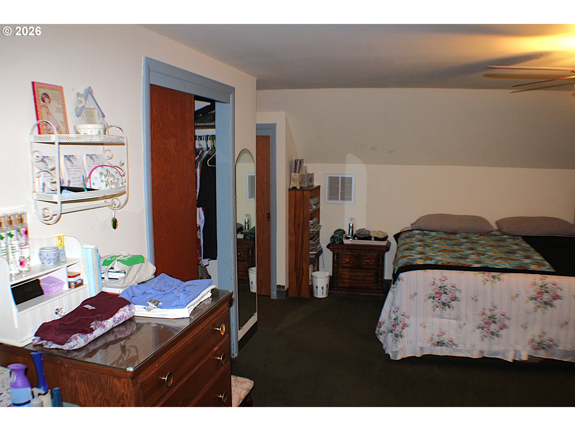 212 Park Street Riddle, OR 97469 - Photo 14 of 34 a bedroom with a bed and with furniture