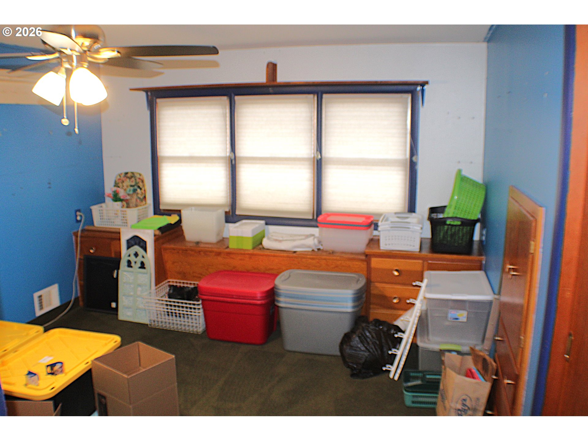 212 Park Street Riddle, OR 97469 - Photo 21 of 34 a living room with furniture a window and a potted plant