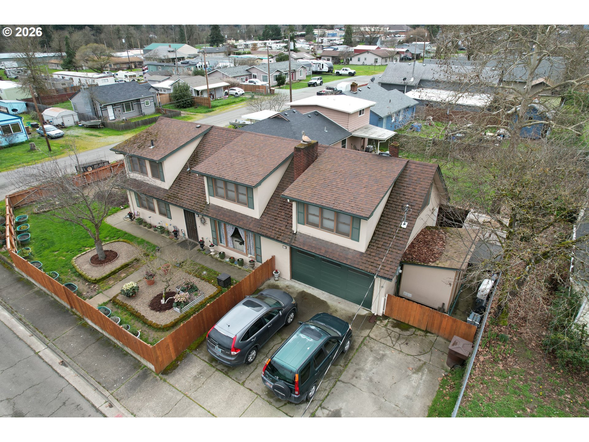212 Park Street Riddle, OR 97469 - Photo 28 of 34 an aerial view of a house with a big yard