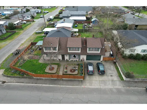 an aerial view of a house with a garden