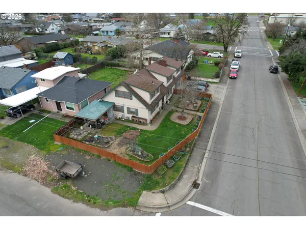 an aerial view of a house with a garden