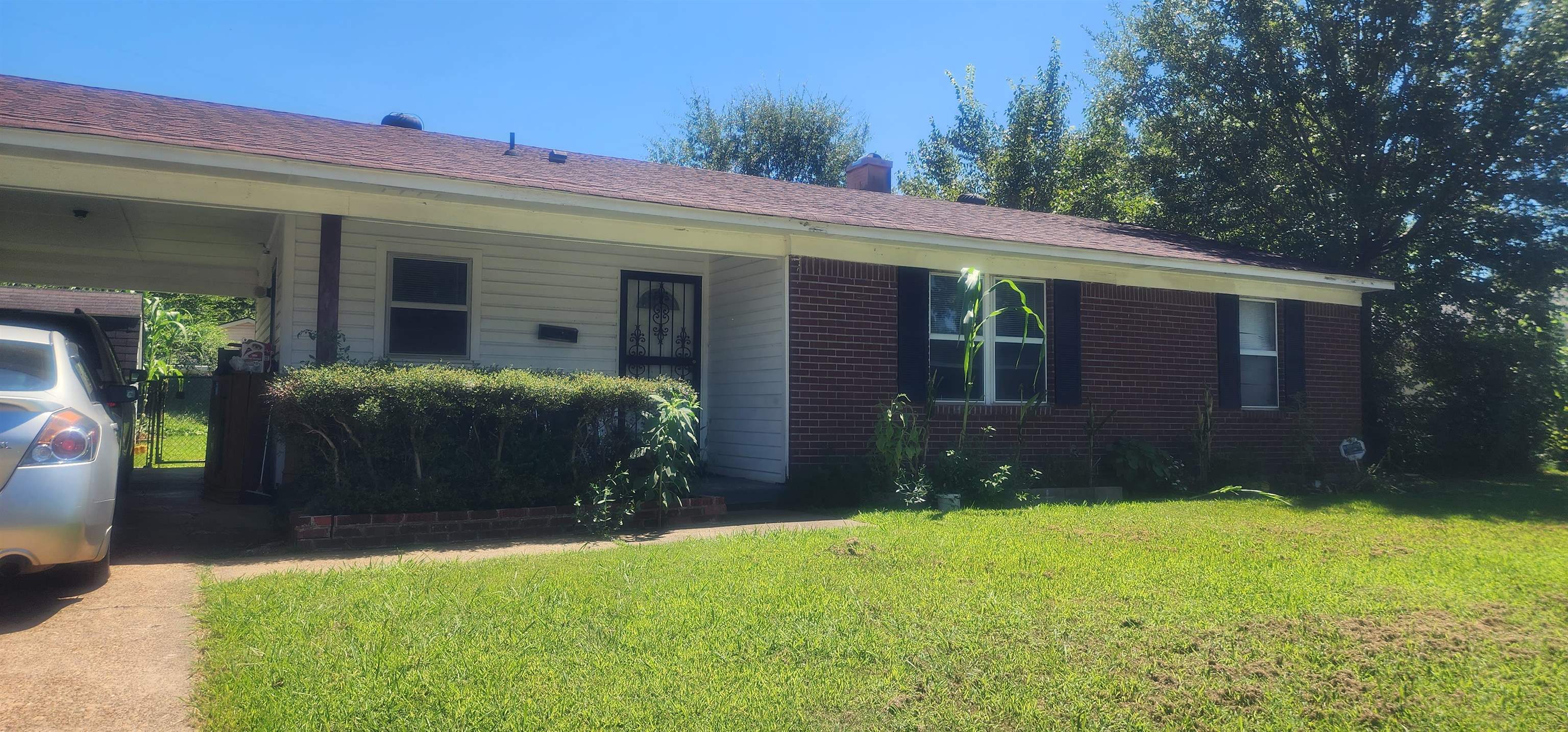 1804 Capri Road Memphis, TN 38117 - Photo 1 of 3 a view of a house with a yard