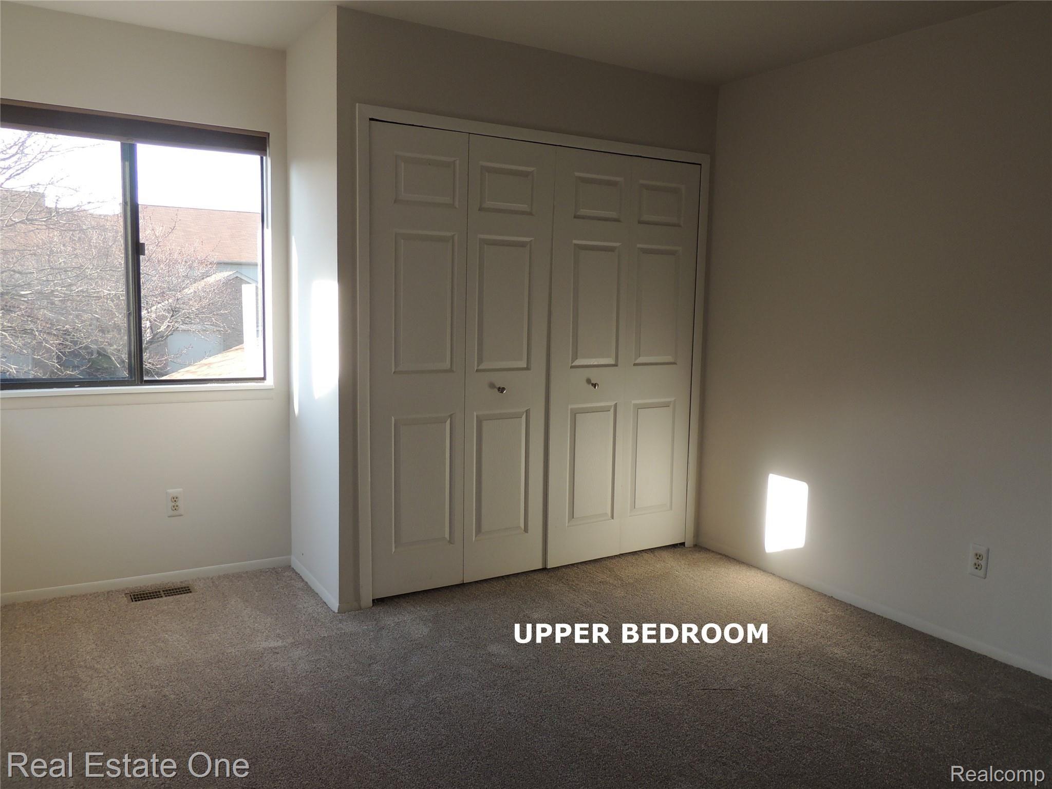 678 Tennyson, Unit 12 Rochester, MI 48307 - Photo 14 of 25 UPPER BEDROOM.JPG