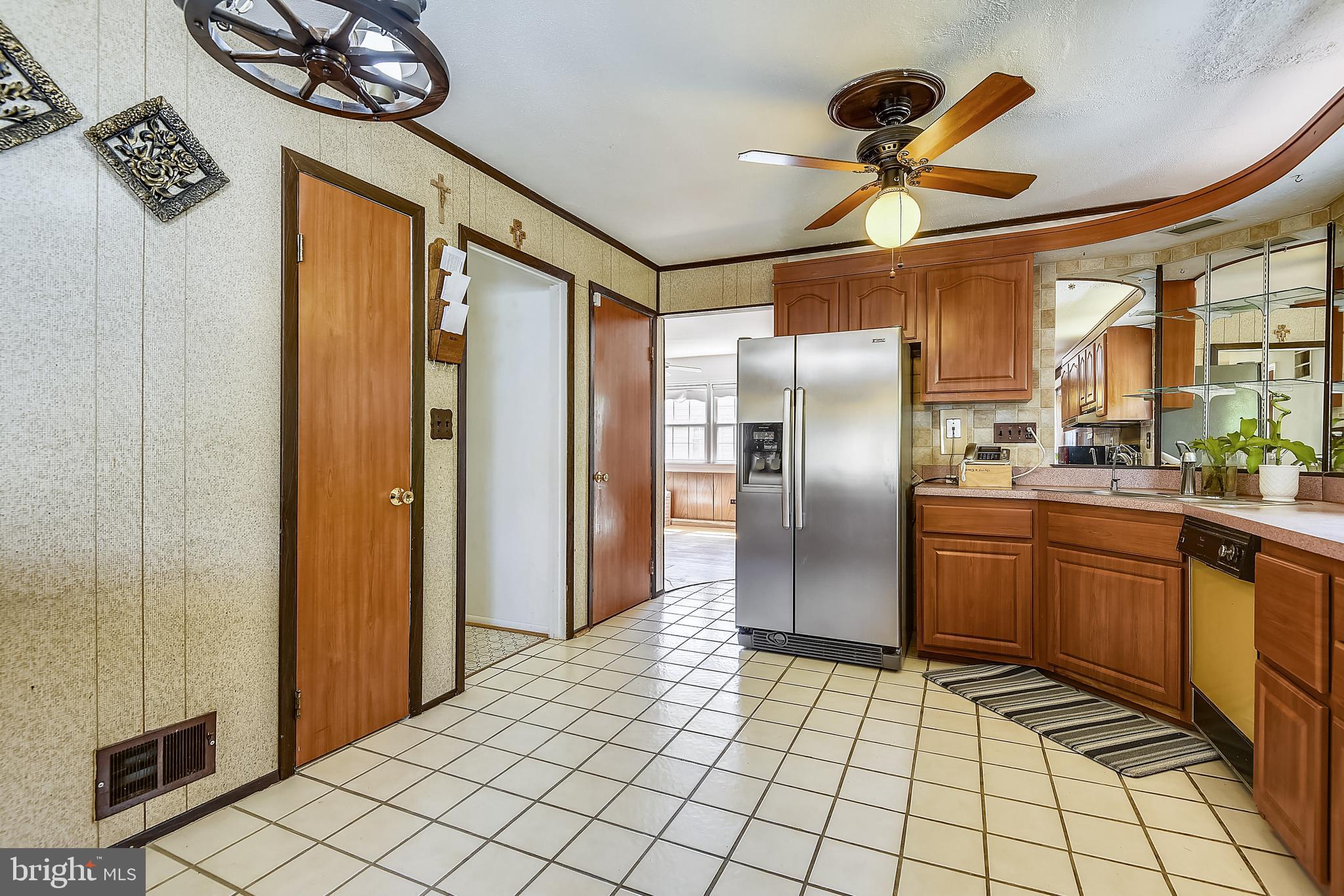 2925 Craiglawn Road Silver Spring, MD 20904 - Photo 40 of 77 Left = pantry; hall to front door; bsmt door