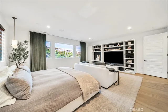 a bed room with a bed and a window