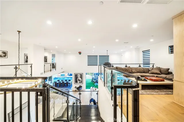 a living room with fireplace furniture and a flat screen tv