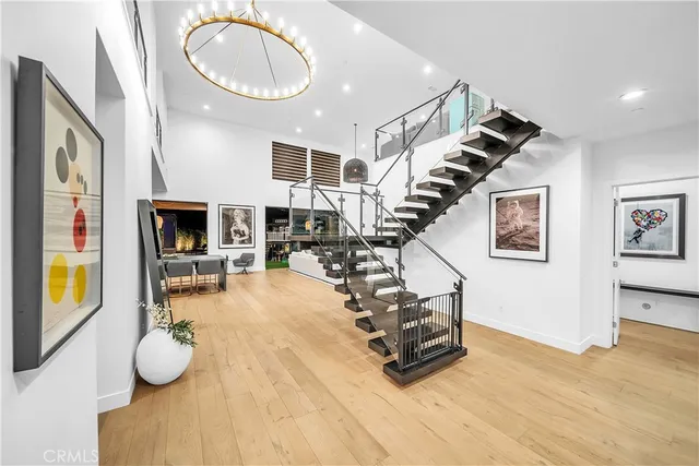 a view of a backyard with garden and patio