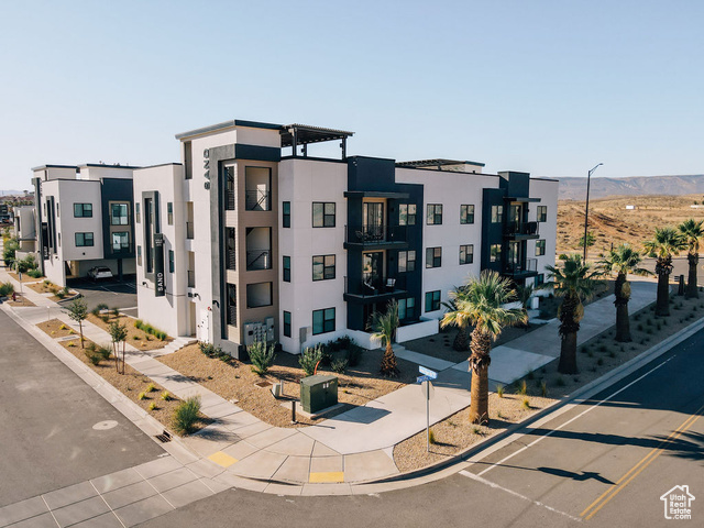 961 West Akoya Pearl Road, Unit 201 St. George, UT 84790 - Photo 3 of 67 View of building exterior with a mountain view