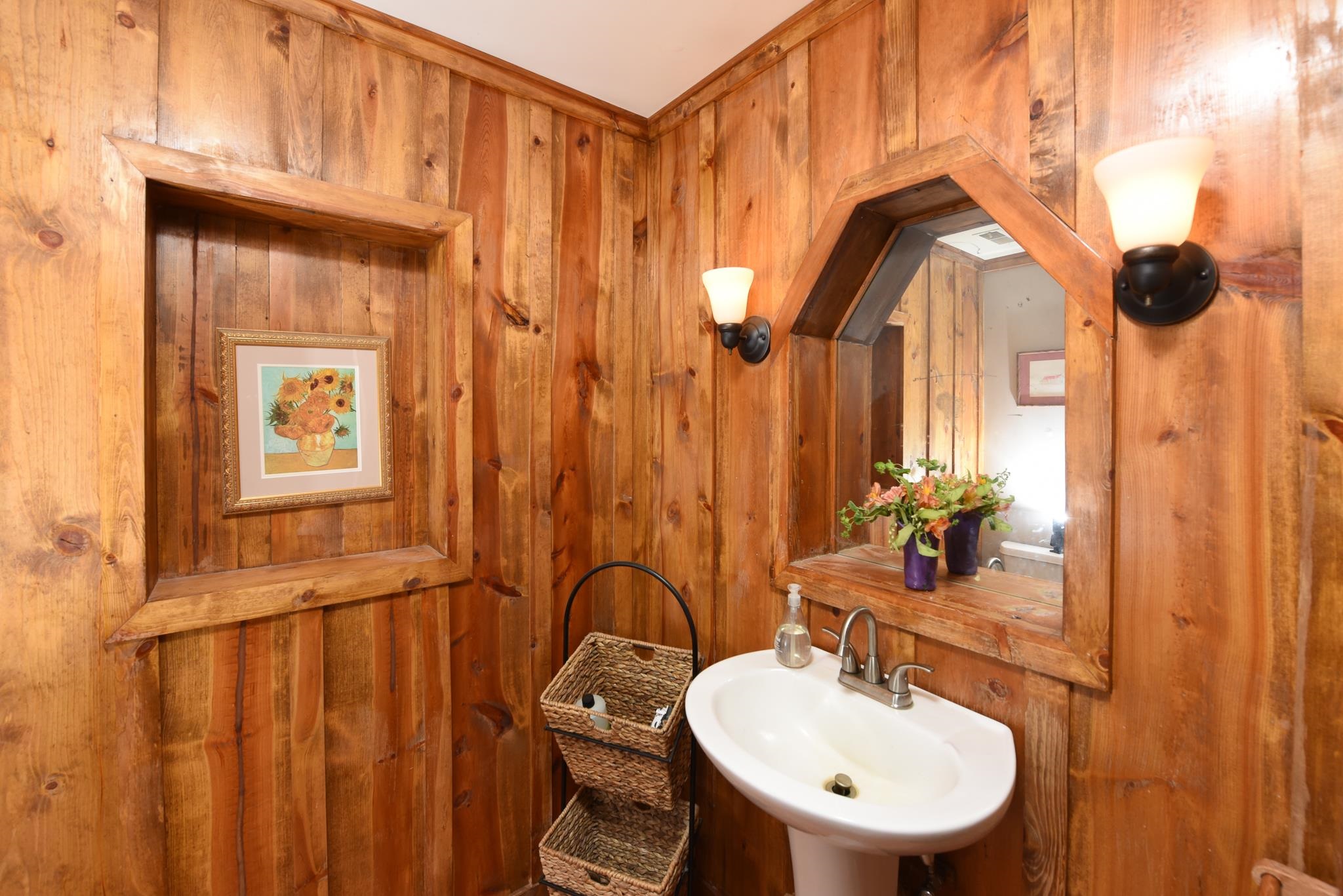 5 Inlet Ocean View, NJ 08230 - Photo 17 of 34 a bathroom with a sink a toilet and a mirror