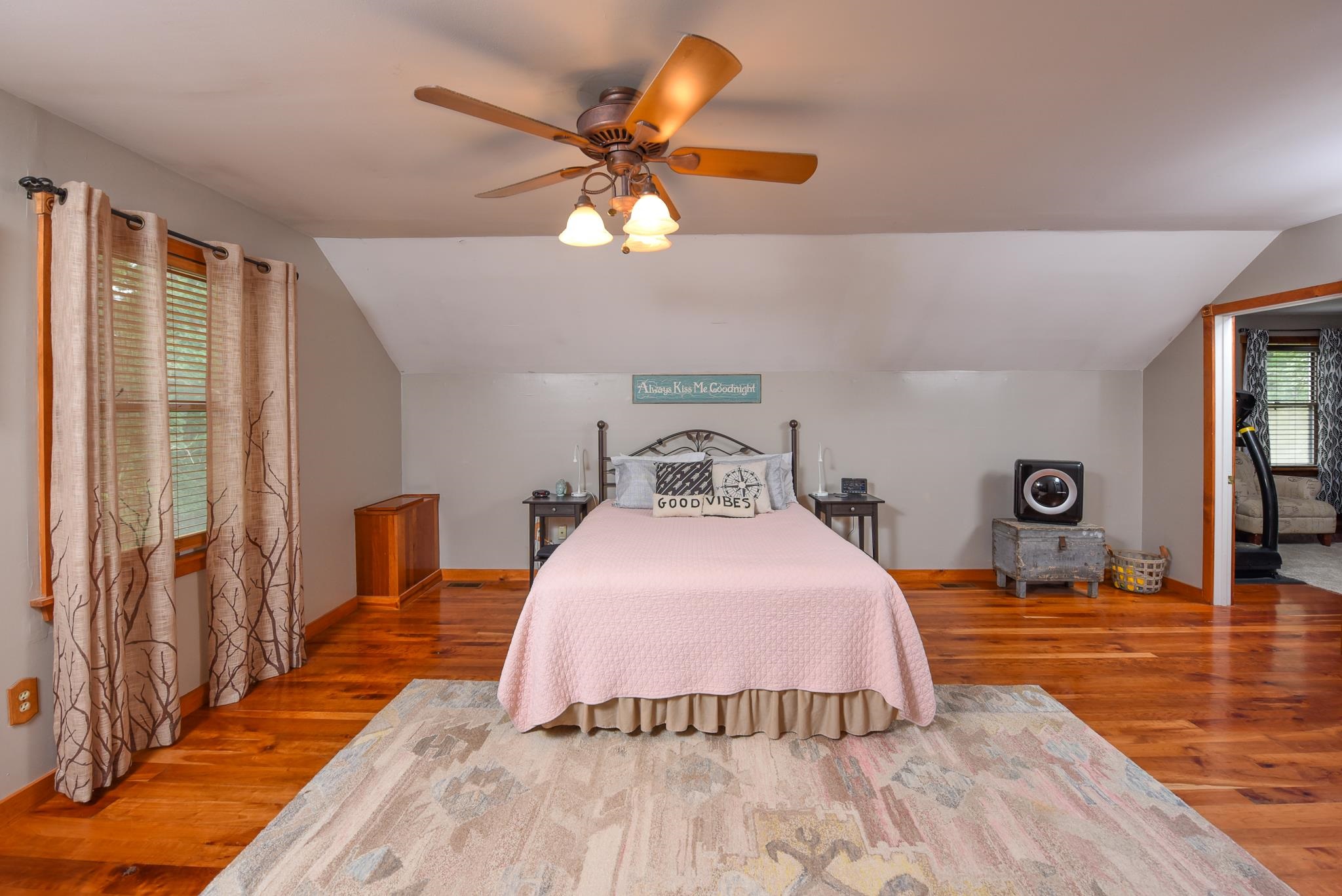 5 Inlet Ocean View, NJ 08230 - Photo 19 of 34 a bedroom with a bed and wooden floor