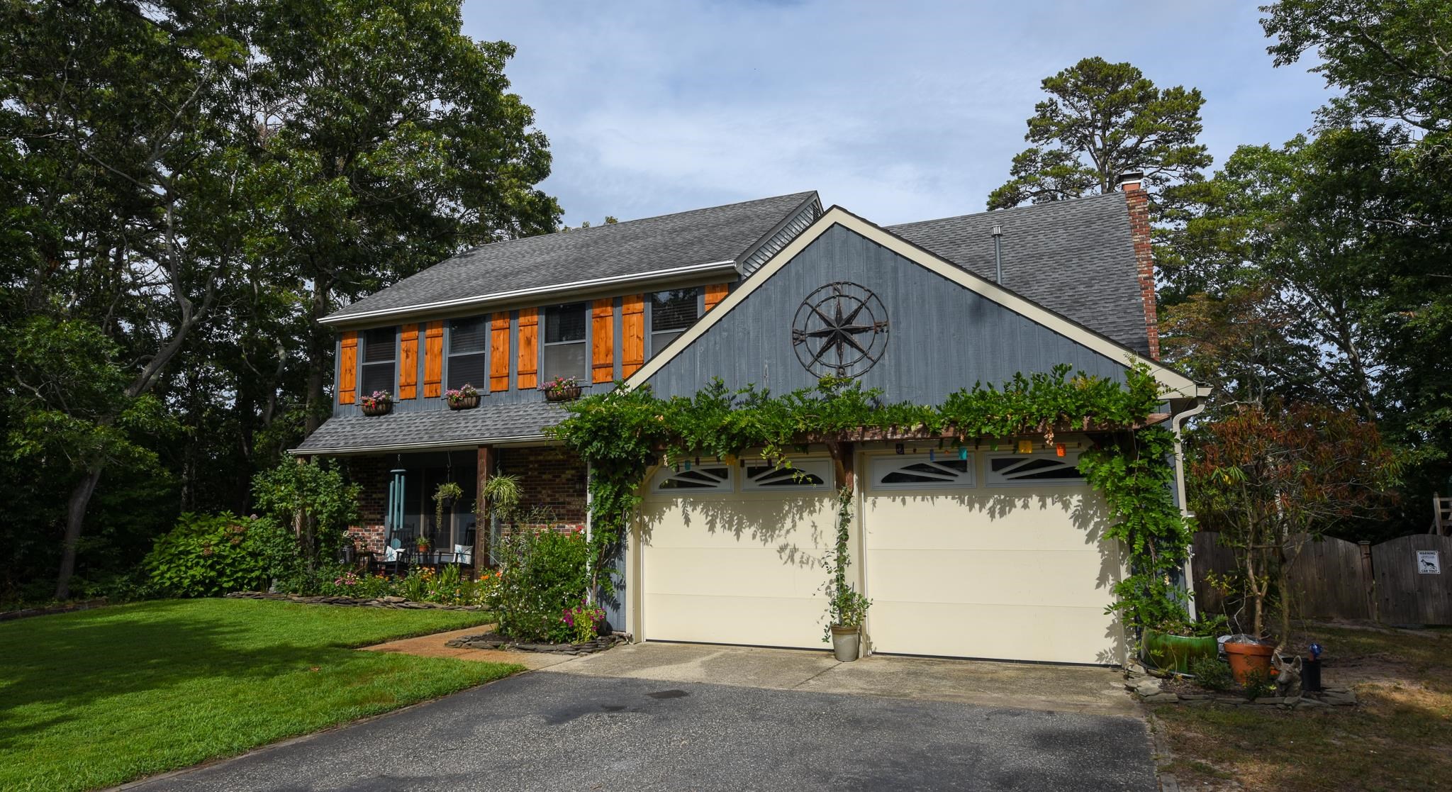5 Inlet Ocean View, NJ 08230 - Photo 2 of 34 a front view of house with yard and green space