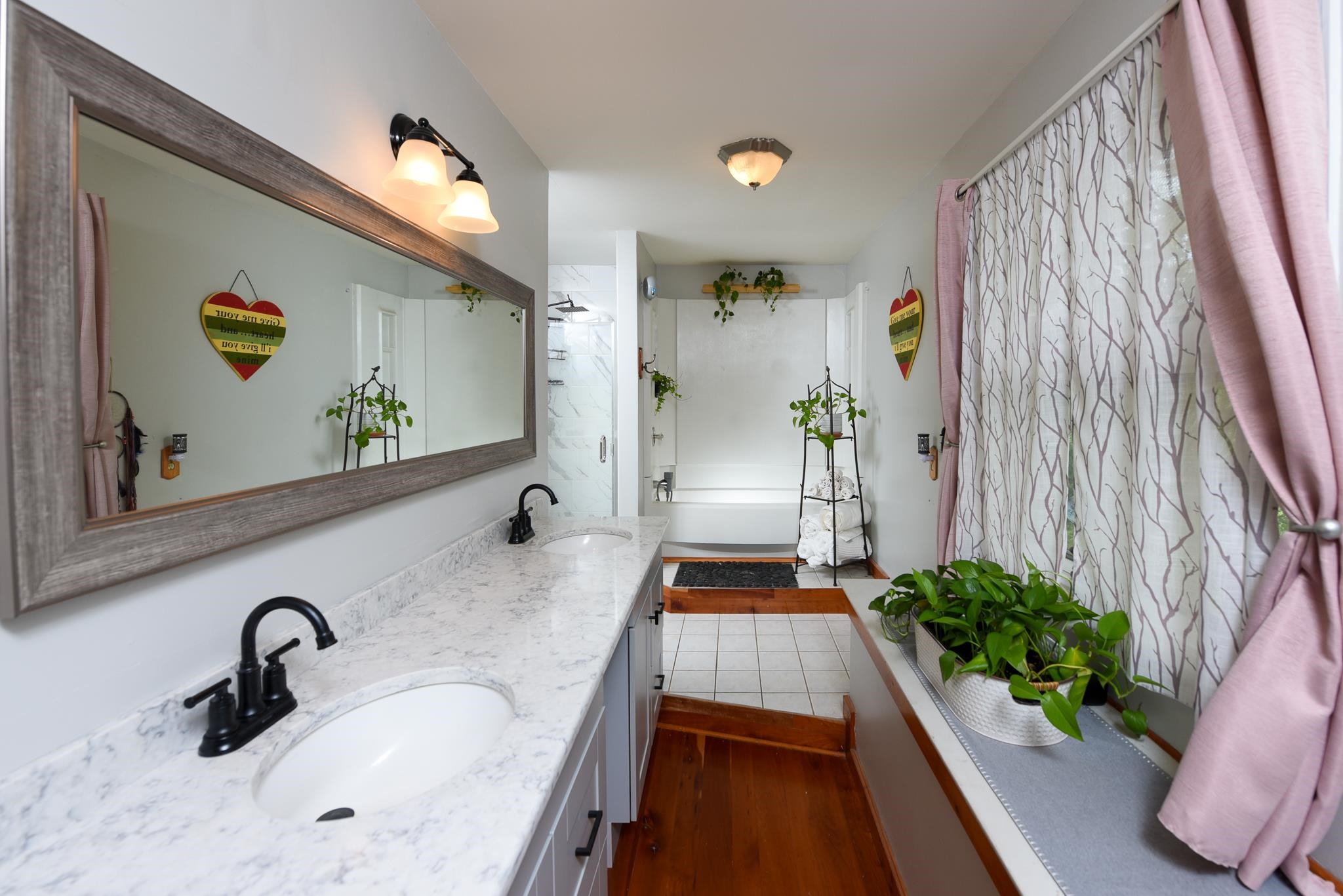5 Inlet Ocean View, NJ 08230 - Photo 24 of 34 a bathroom with a tub and sink