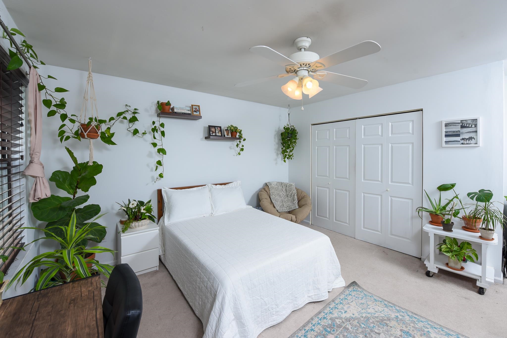 5 Inlet Ocean View, NJ 08230 - Photo 31 of 34 a bedroom with a bed potted plant and a window