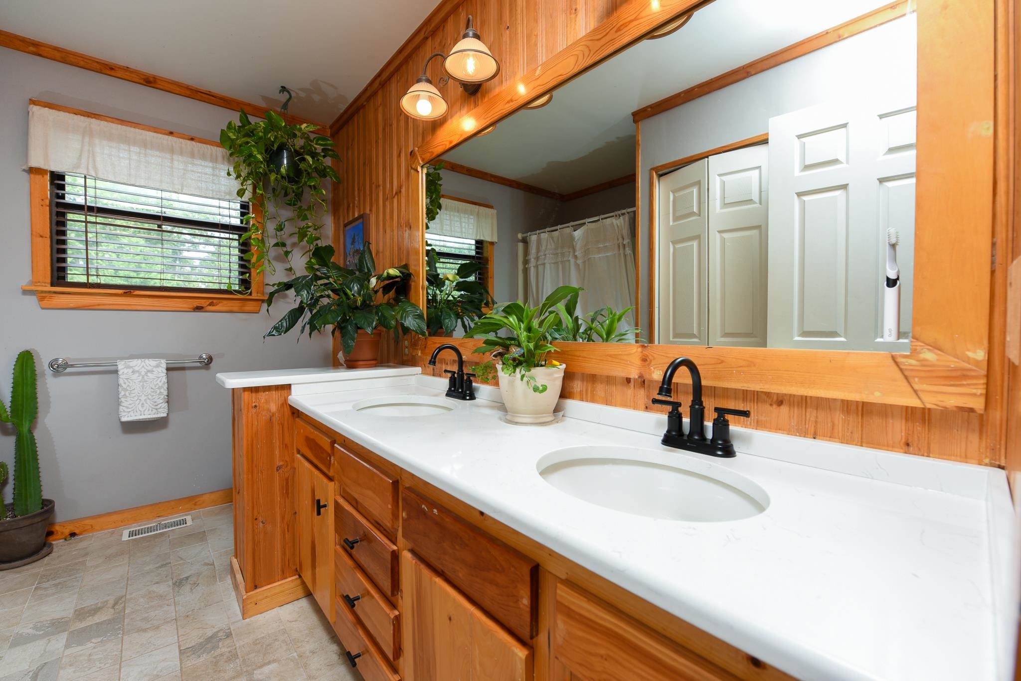 5 Inlet Ocean View, NJ 08230 - Photo 33 of 34 a bathroom with a sink and a mirror