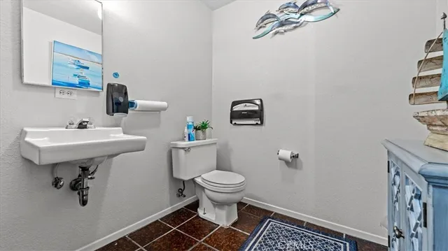 a bathroom with a sink and a toilet