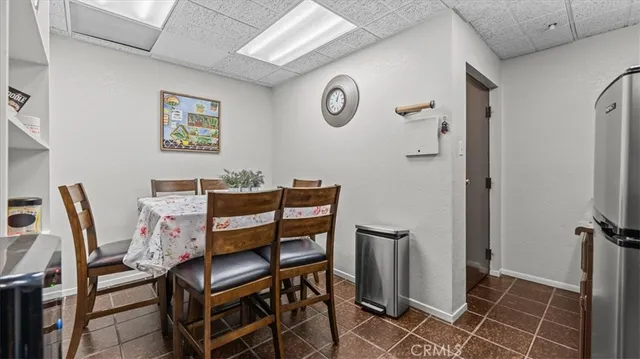 a kitchen that has a sink and a stove