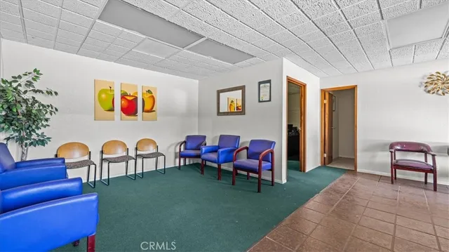 a workspace with furniture and window