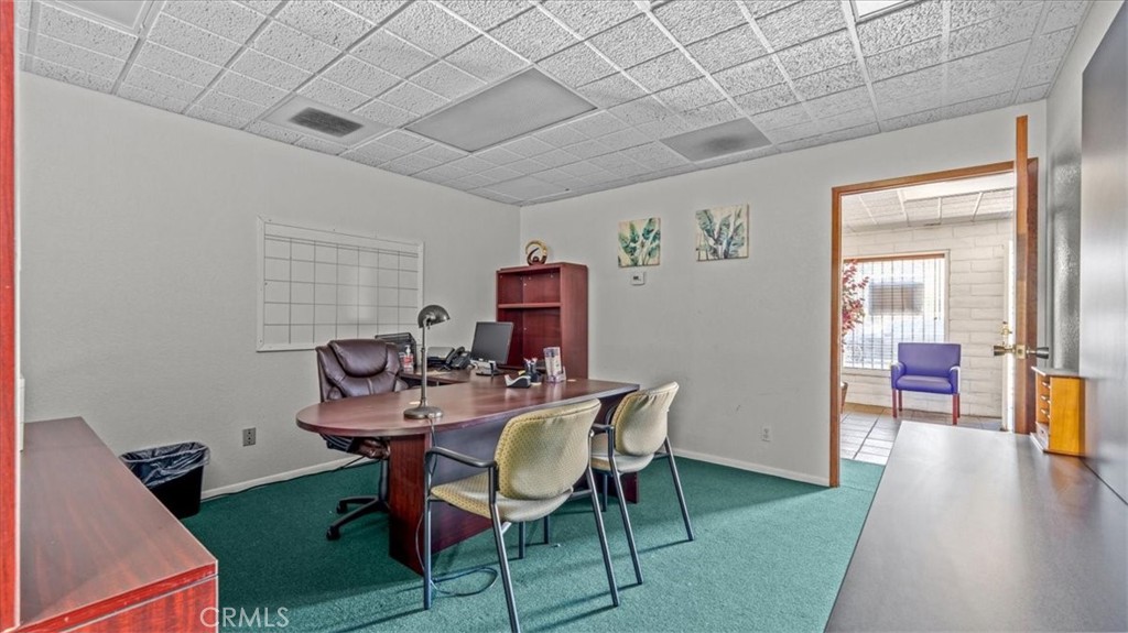 580 East Foothill Boulevard Azusa, CA 91702 - Photo 25 of 36 a view of a dining room with furniture and wooden floor