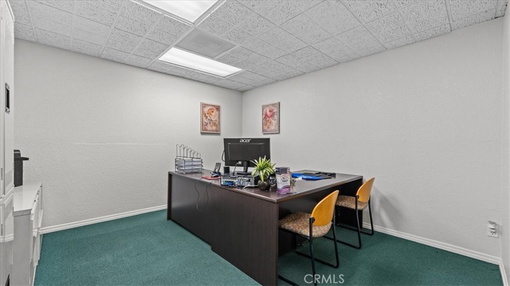 580 East Foothill Boulevard Azusa, CA 91702 - Photo 26 of 36 a room with furniture and wall paintings