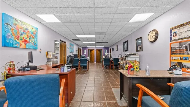 a view of a livingroom with furniture and a couch