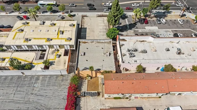 an aerial view of a house with a potted plant