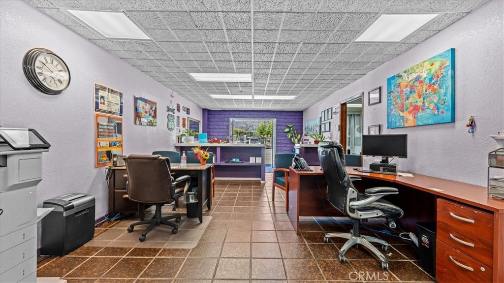 580 East Foothill Boulevard Azusa, CA 91702 - Photo 4 of 36 a view of a workspace with furniture and a window