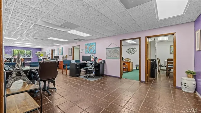 a view of a livingroom with furniture and a livingroom