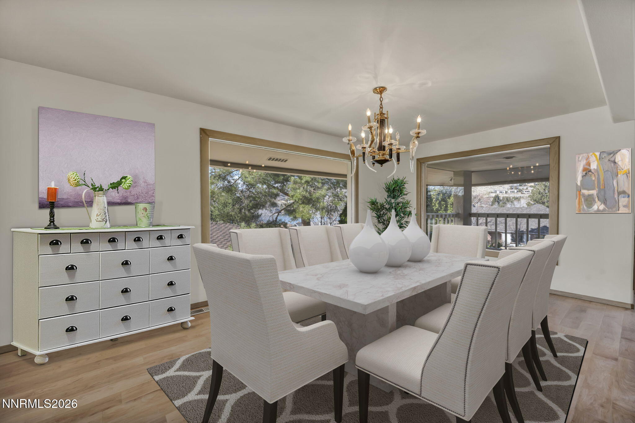 2570 Spinnaker Drive Reno, NV 89519 - Photo 11 of 41 a dining room with furniture a large window and wooden floor