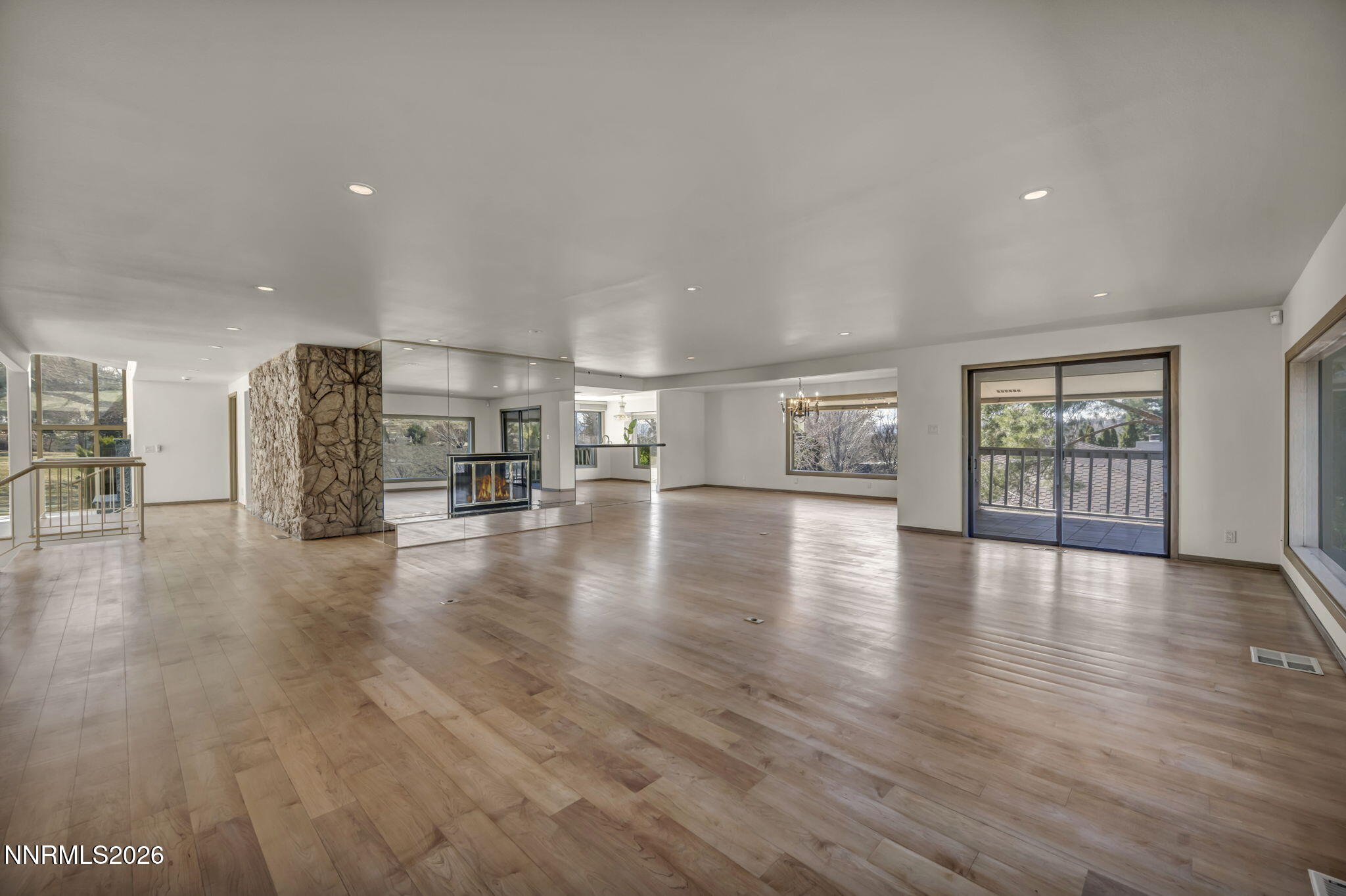 2570 Spinnaker Drive Reno, NV 89519 - Photo 19 of 41 a view of an empty room with wooden floor and a window