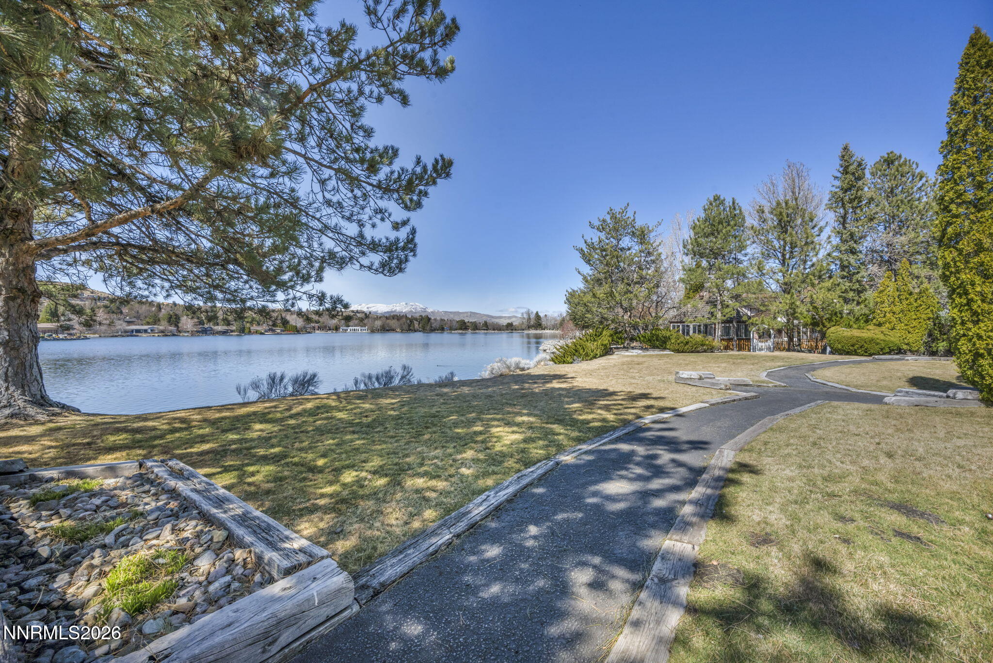 2570 Spinnaker Drive Reno, NV 89519 - Photo 35 of 41 a view of a yard with an trees