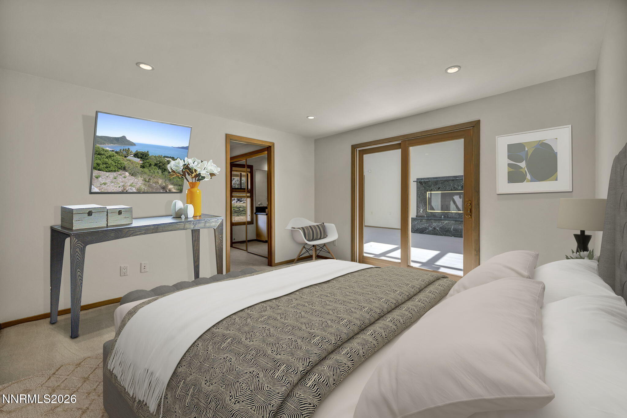 2570 Spinnaker Drive Reno, NV 89519 - Photo 5 of 41 a bedroom with a large bed and a window