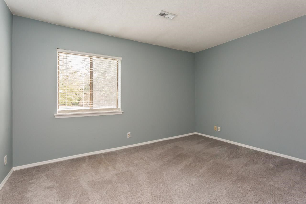 5036 Flint Ridge Place, Unit 5036 Raleigh, NC 27609 - Photo 12 of 18 a view of room with window