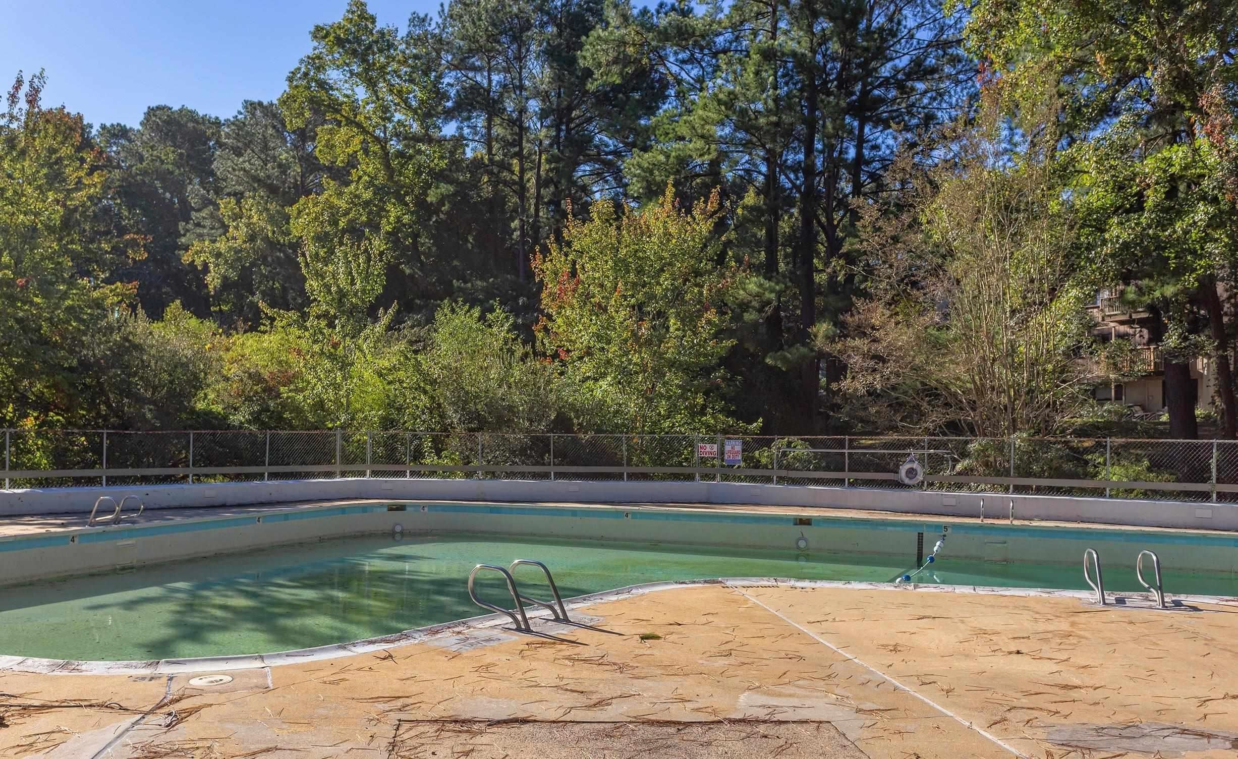 5036 Flint Ridge Place, Unit 5036 Raleigh, NC 27609 - Photo 16 of 18 a view of a yard